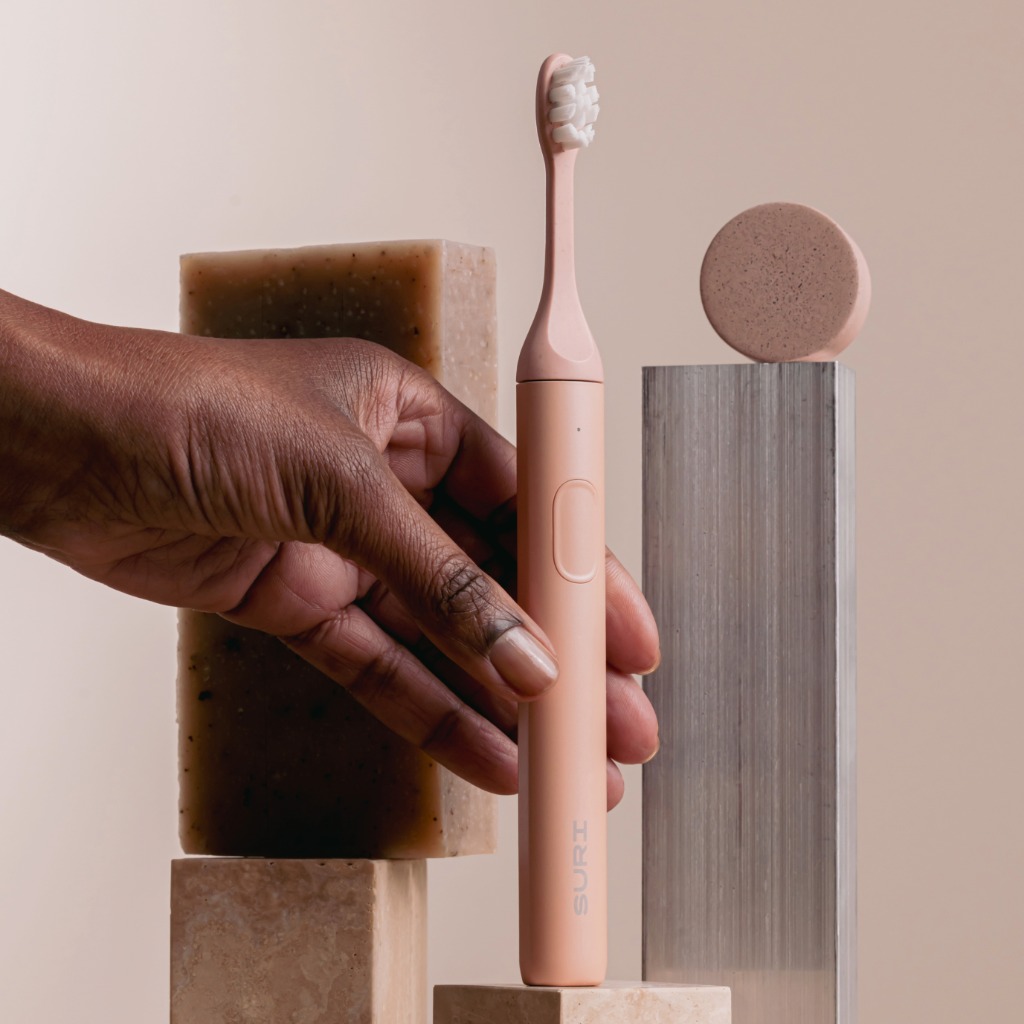 SURI Sustainable Electric Toothbrush in Peach 'Sunset Bloom' Colour SURI Sustainable Electric Toothbrush in Peach 'Sunset Bloom' Colour